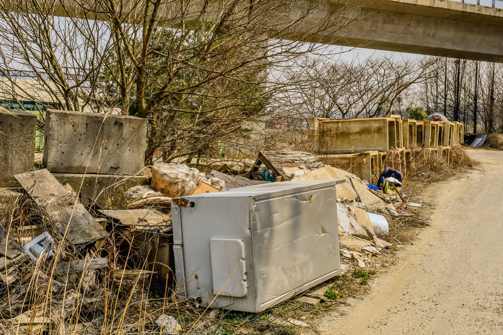 Old refrigerator ready for haul away and eco-friendly disposal