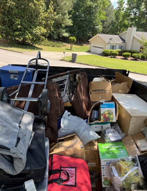 A dumpster full of junk from a client's house
